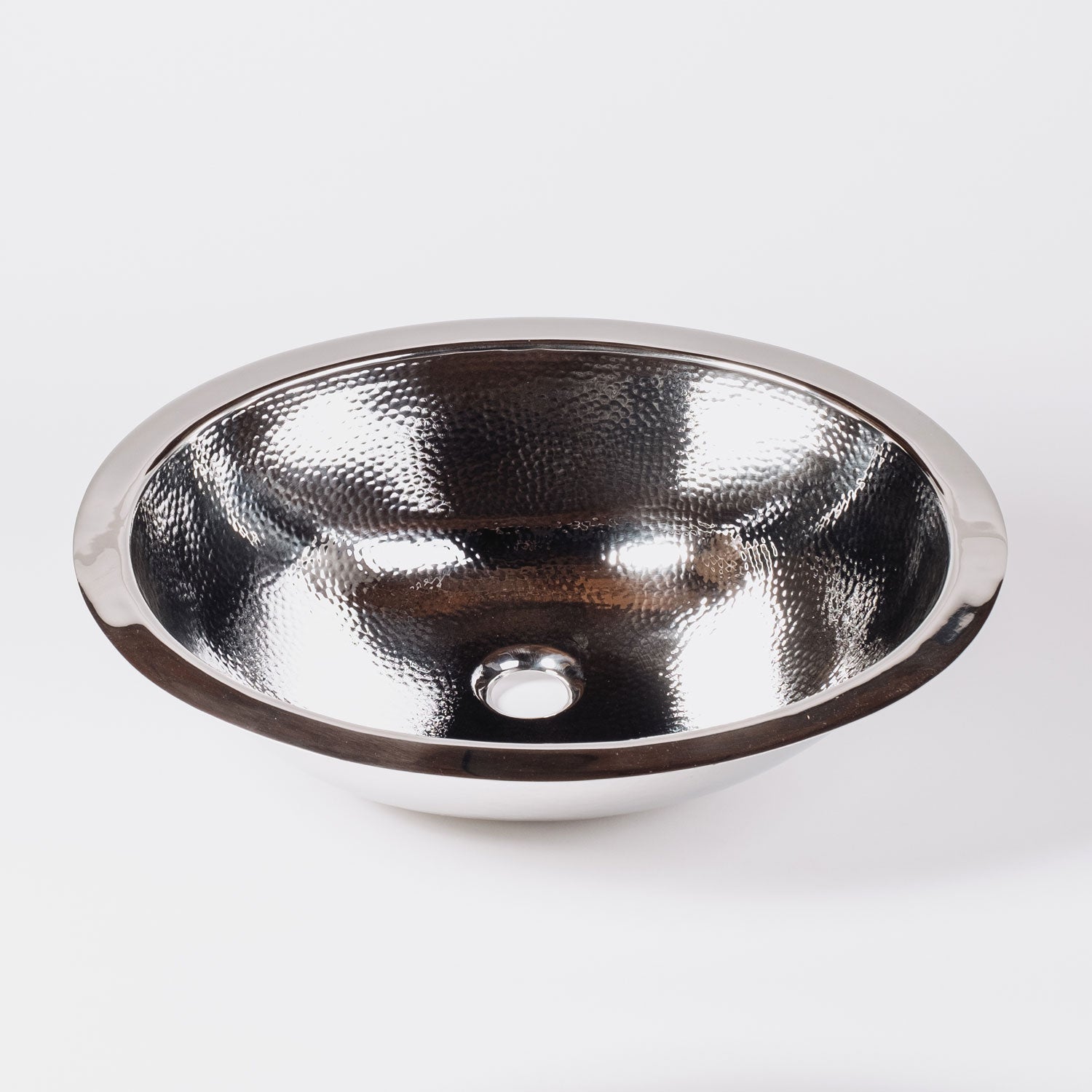Stainless Steel Oval Bath Sink is hammered and has a polished finish.