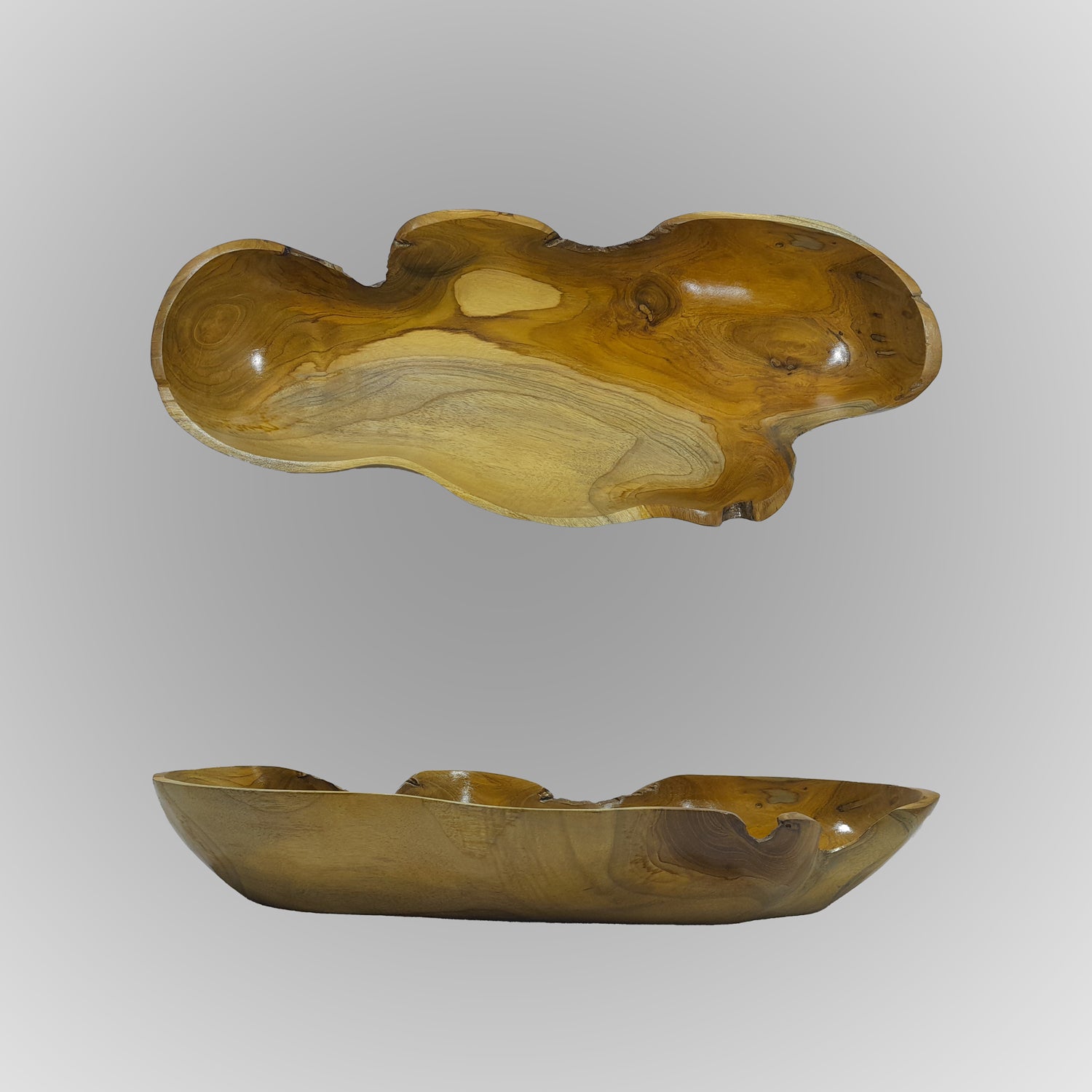 Wooden bowl with natural edge design on a gray background