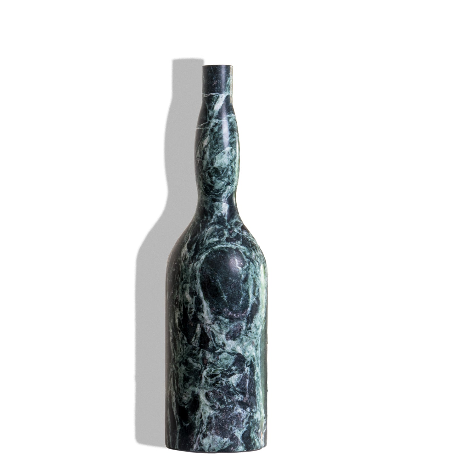 India green marble sculptural bottle form