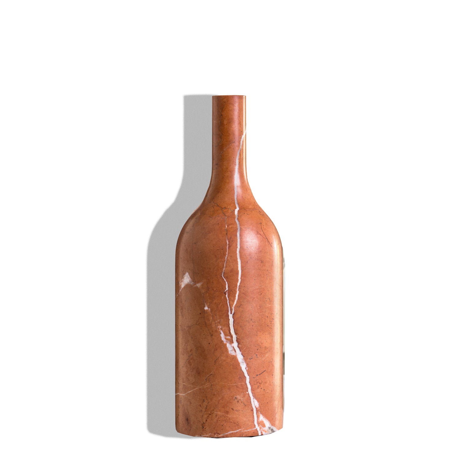Rojo Alicante marble sculptural bottle form