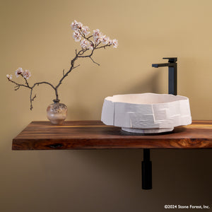 Raku Vessel bath sink is carved from desert cream limestone. image 1 of 2