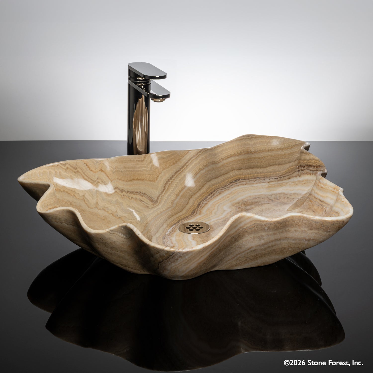 Leaf shaped vessel sink in honey onyx