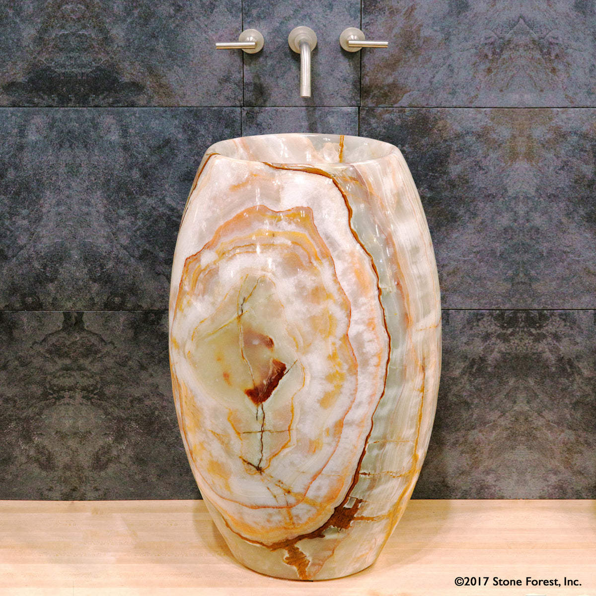 Stone Forest Barrel Pedestal Sink carved from a single block of multi-color onyx image 3 of 3