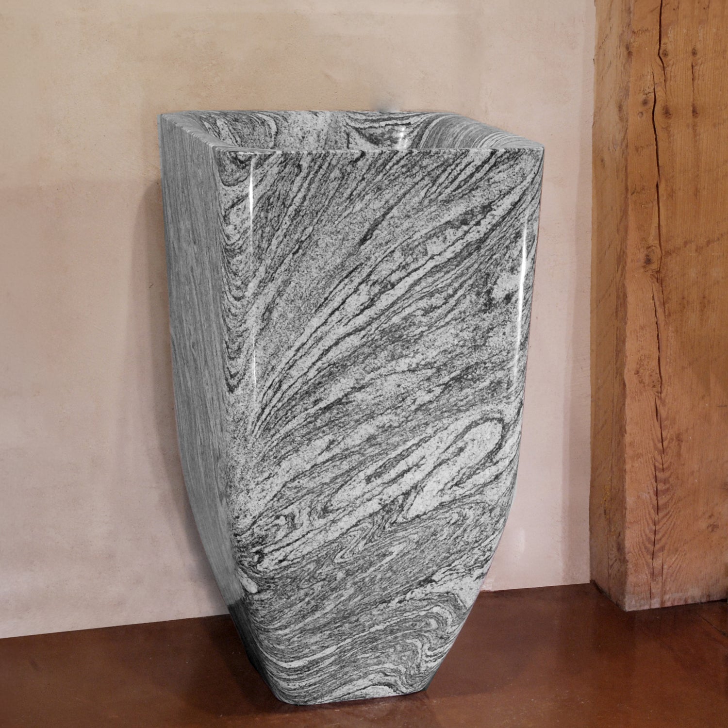 Custom Pedestal Sink carved from cumulo granite