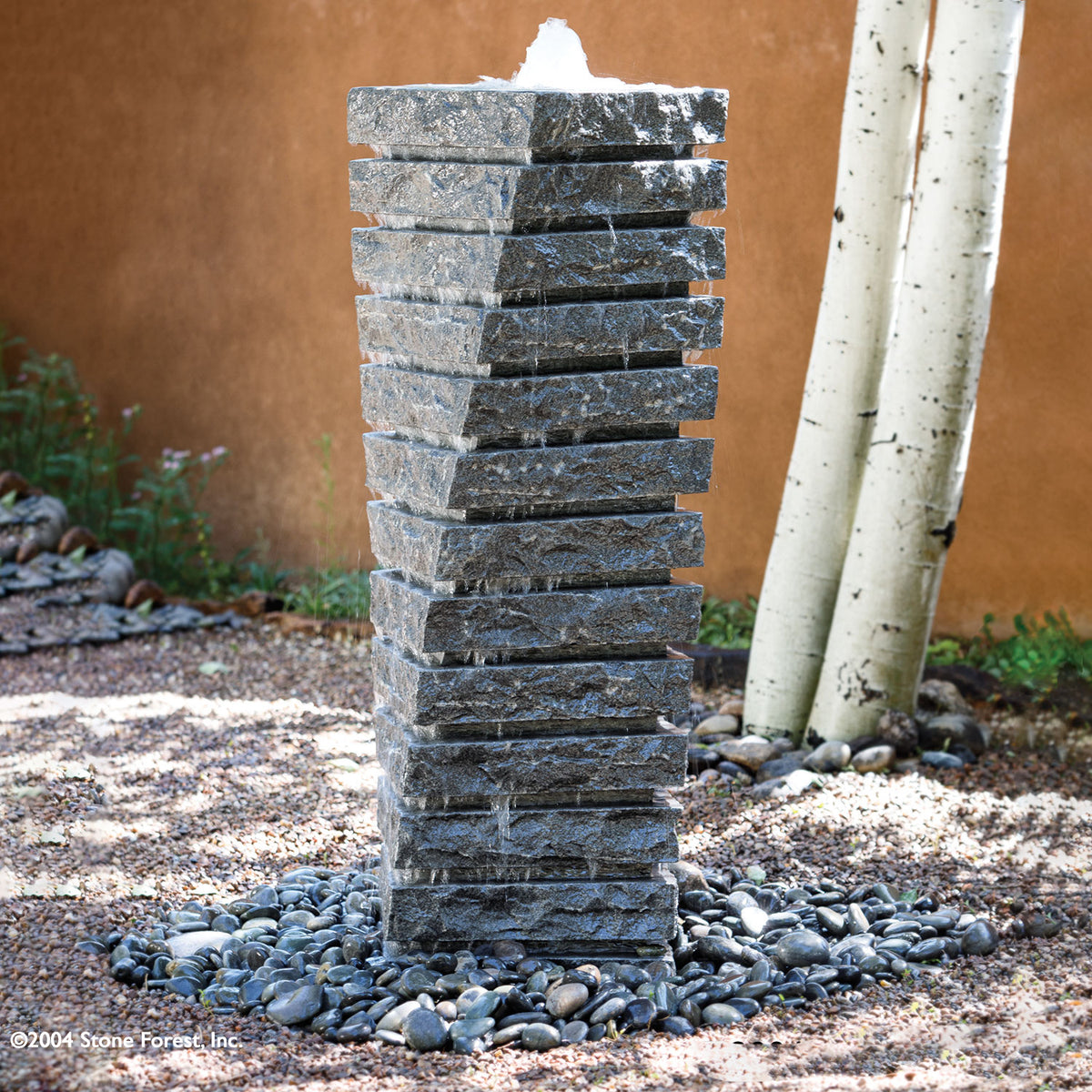 Stone Forest Tiered Helix garden fountain in gray granite image 1 of 3