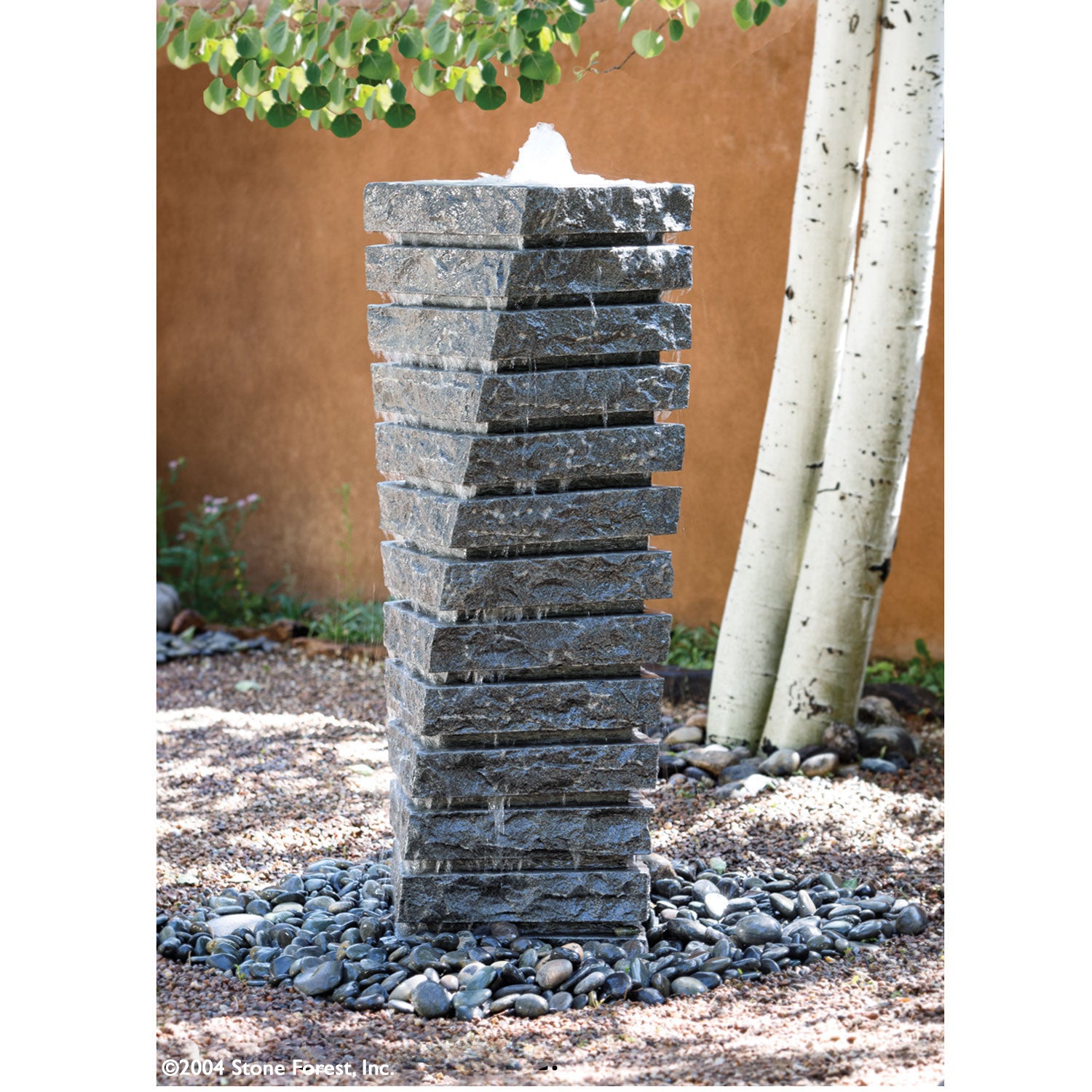 Stone Forest Tiered Helix garden fountain in gray granite