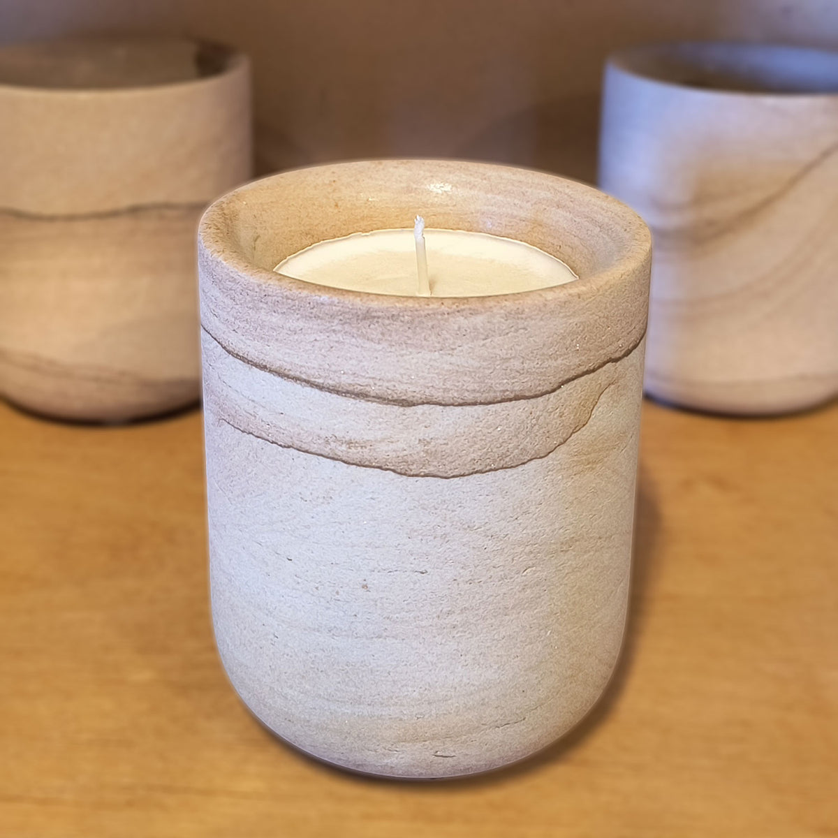 Sandstone cup with candle inside image 3 of 5