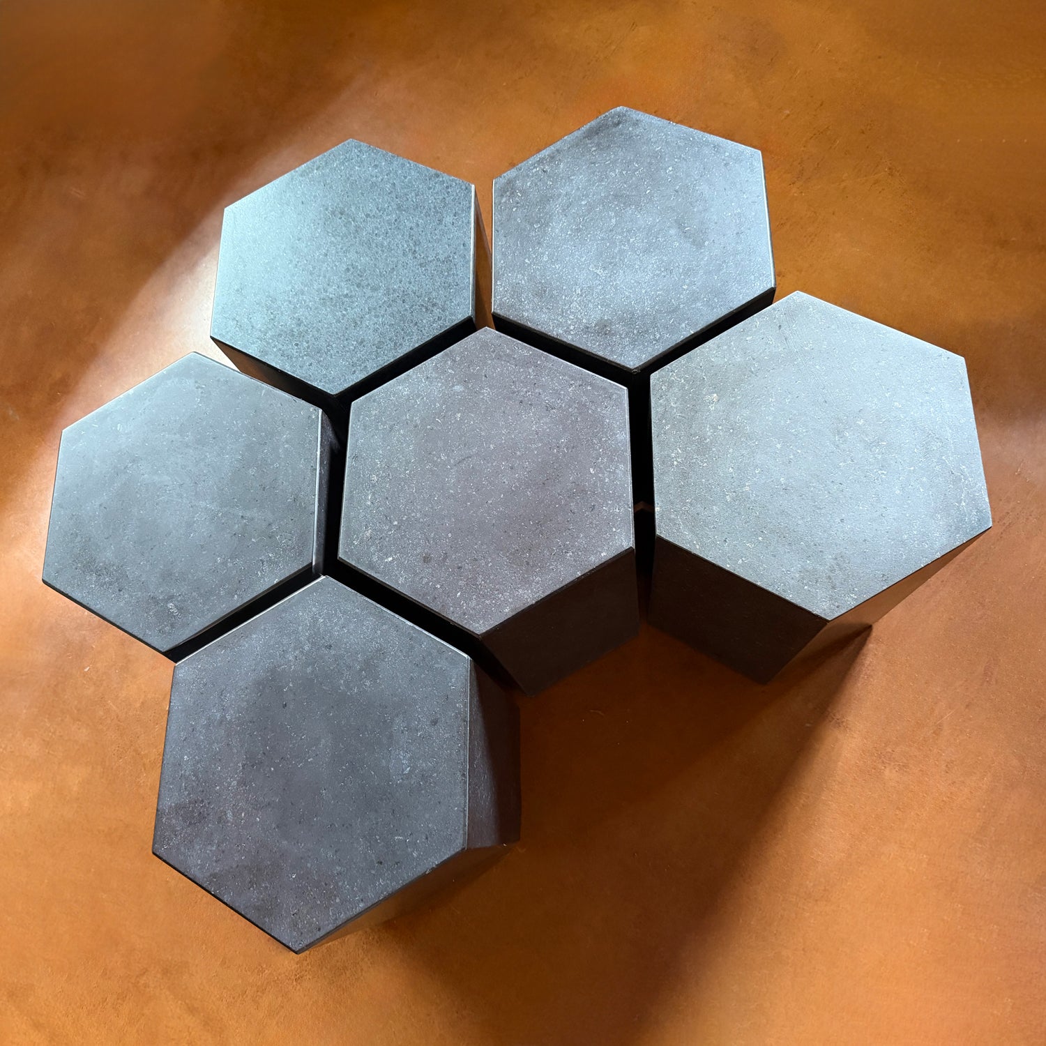 Hexagonal tables in honed basalt