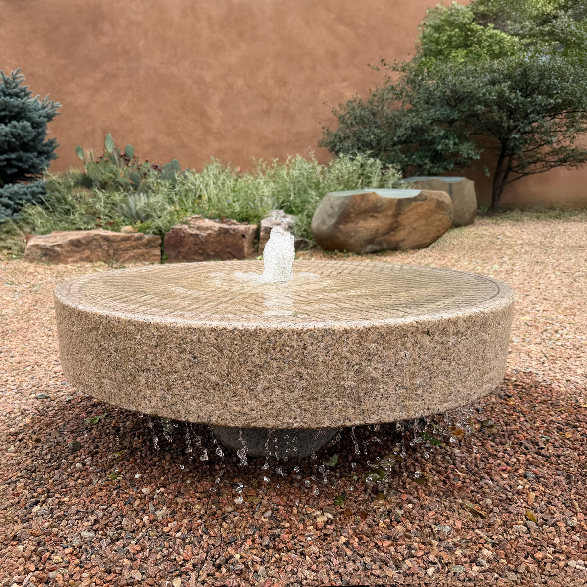 Old World Millstone Fountain in beige granite