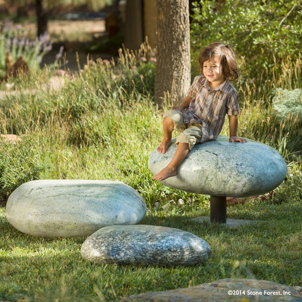 Stone Forest pebble seats carved from green marble image 1 of 5