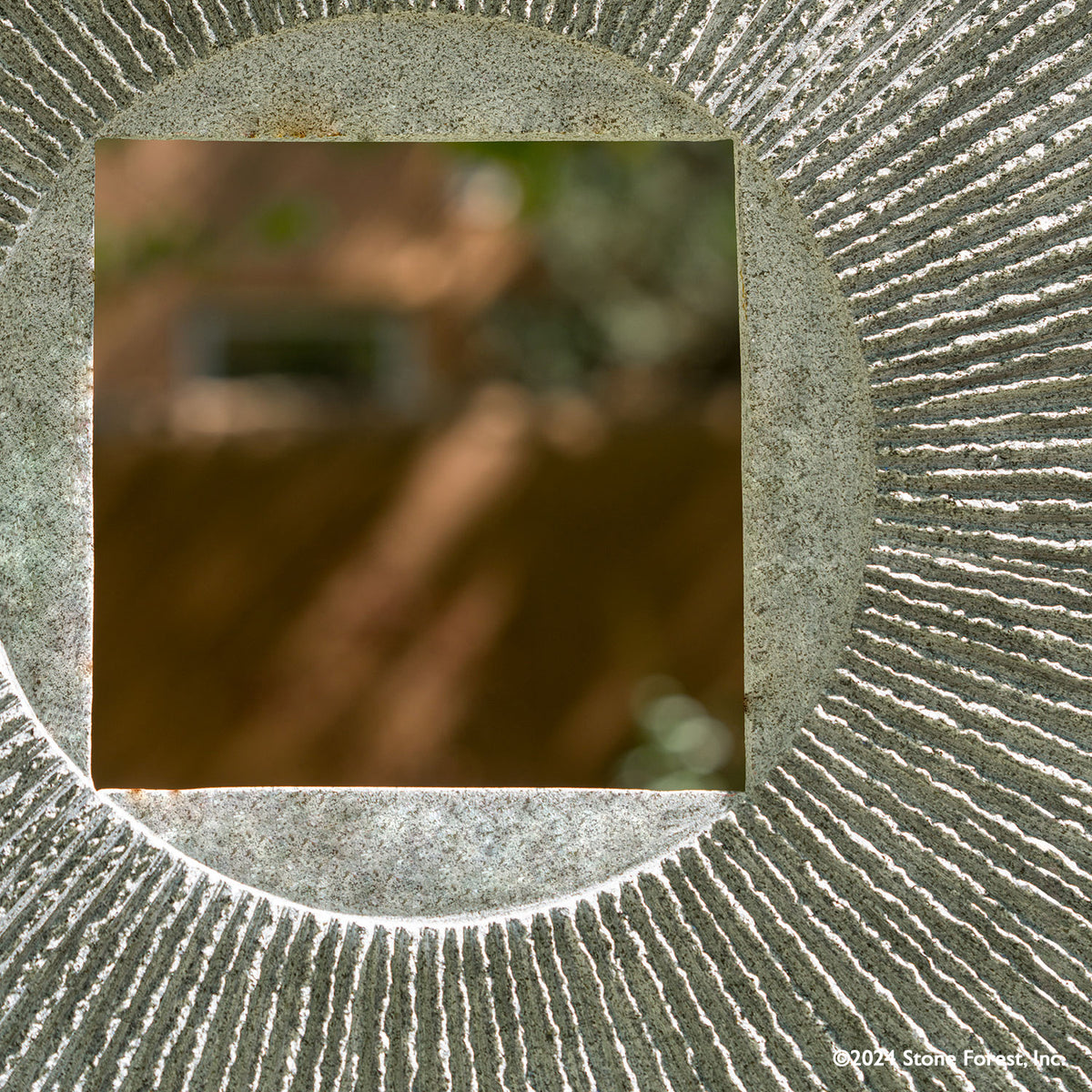 Gallery-worthy sculpture, ancient/contemporary. The hand-carved blue-gray granite pendant features a ribbed pattern on both surfaces and can be used indoors or outdoors, supported by an iron stand. image 4 of 5