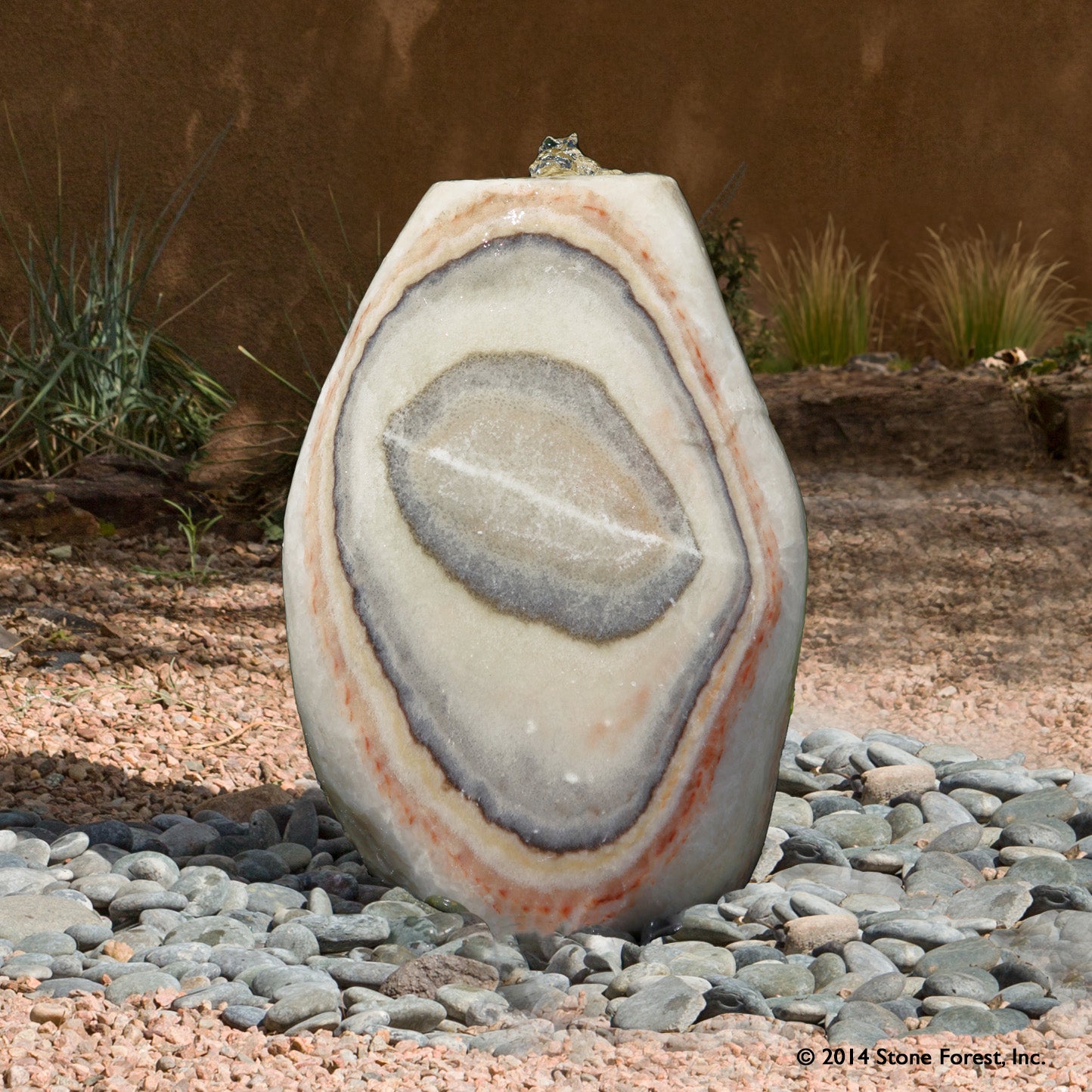 Stone Forest Pebble garden fountain carved from onyx 24" high