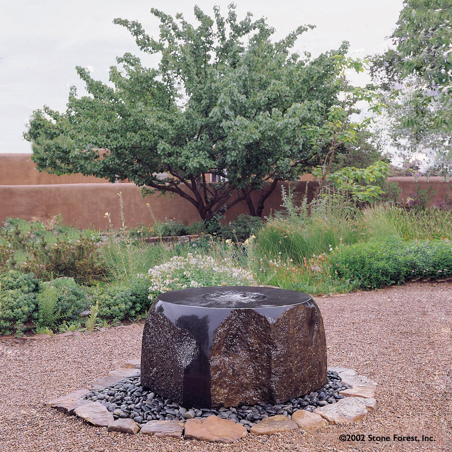 Maru Garden Fountain carved from basalt.