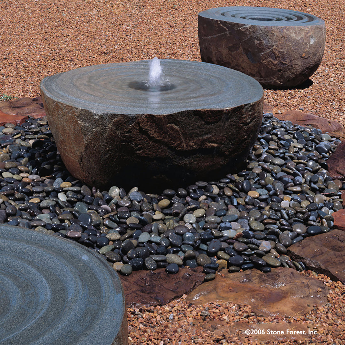 Three Stone Forest small Swirl garden fountains carved from granite image 1 of 2