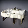 Fluted Lumbre Sink paired with Elemental Facet Wall Unit
