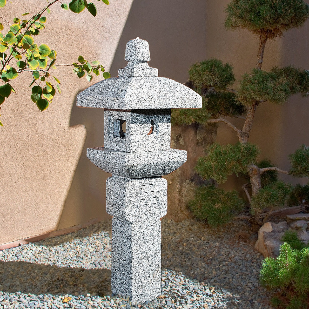 Stone Forest Oribe lantern is an ikekomi-gata-style stone lantern (post lantern) carved from black and white granite.