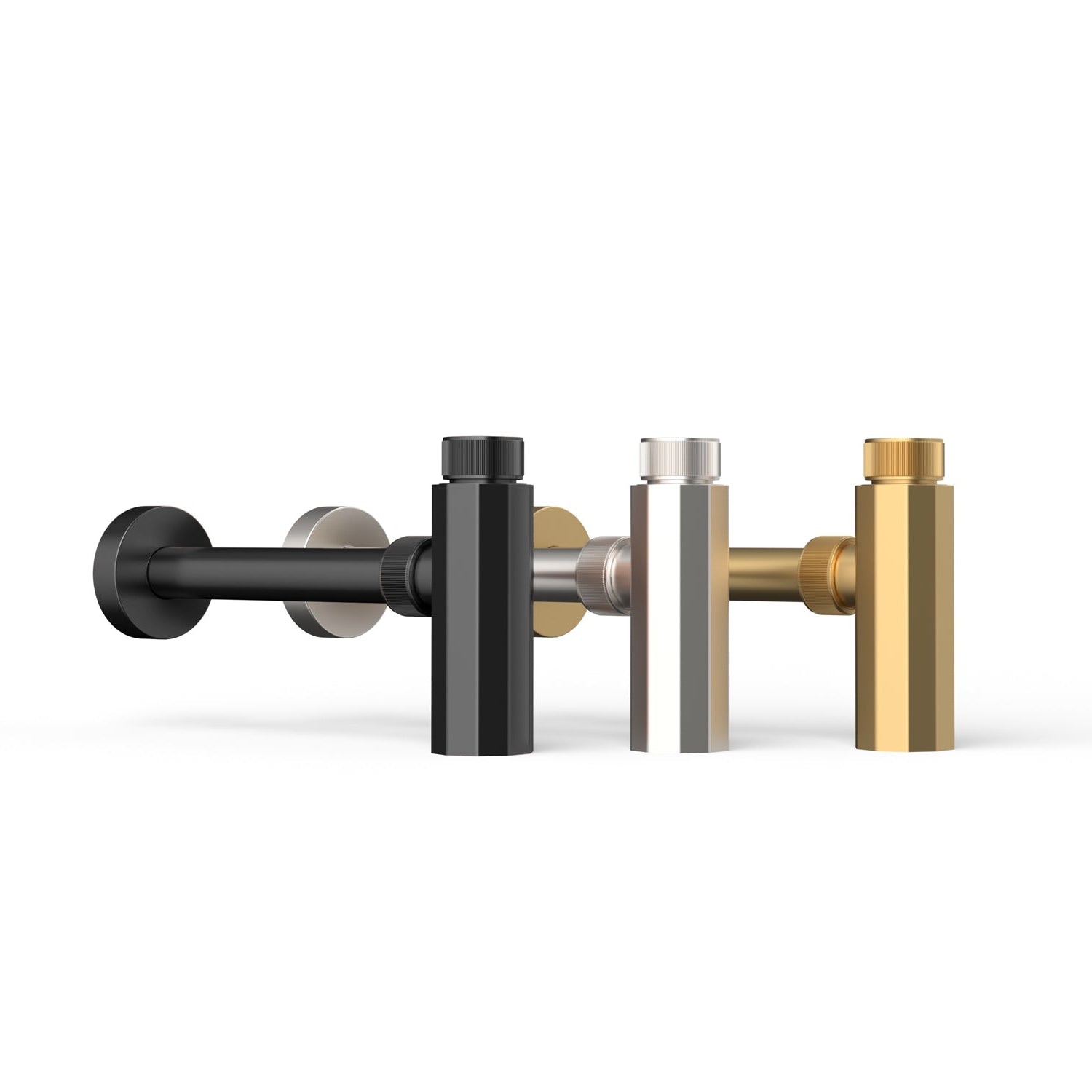 Matte black, polished nickel and aged brass lavatory traps with a wall outlet and inlet, part of the Elemental Collection.
