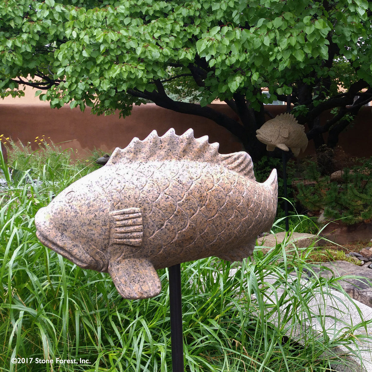 Stone Forest curved fish carved from beige granite image 1 of 5