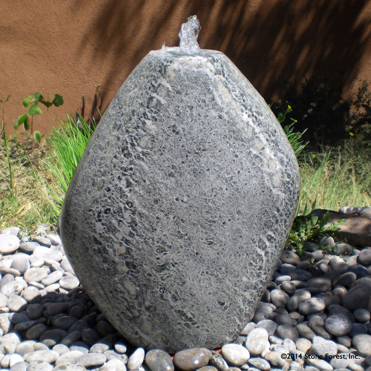Stone Forest Pebble garden fountain carved from green marble 36