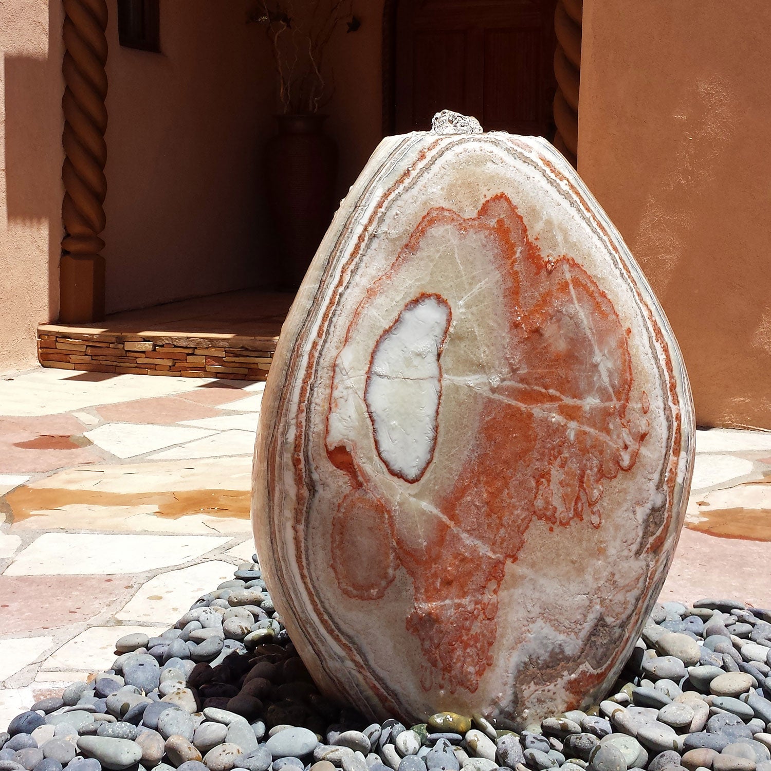 36" high Pebble Fountain carved from Onyx