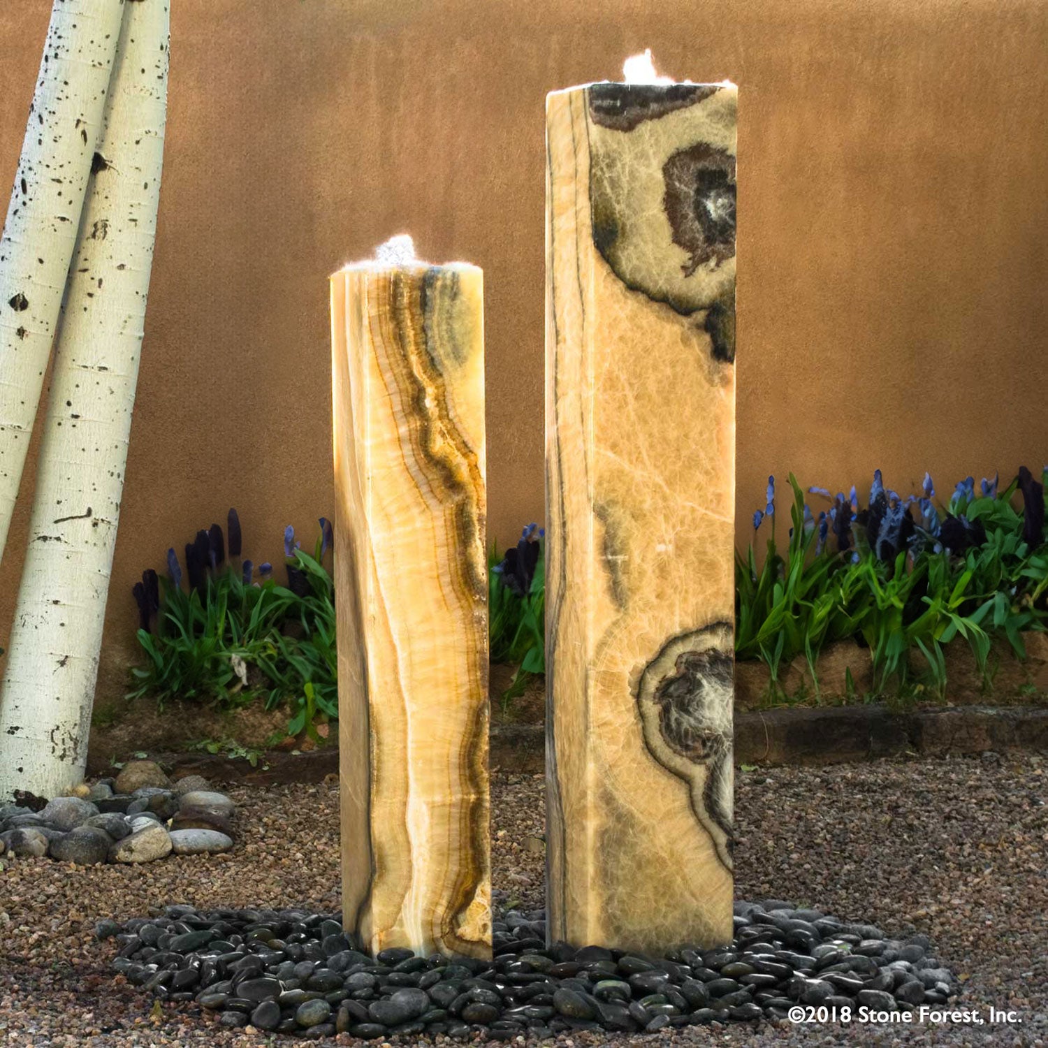 Stone Forest Modern Plinth garden fountain carved from multi-colored onyx
