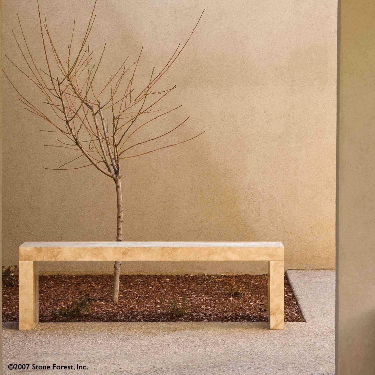 The Sierra Bench is a contemporary piece made of three solid stone slabs joined together using mortise and tenon-style joints. Carved from Travertino Romano, which is a type of travertine