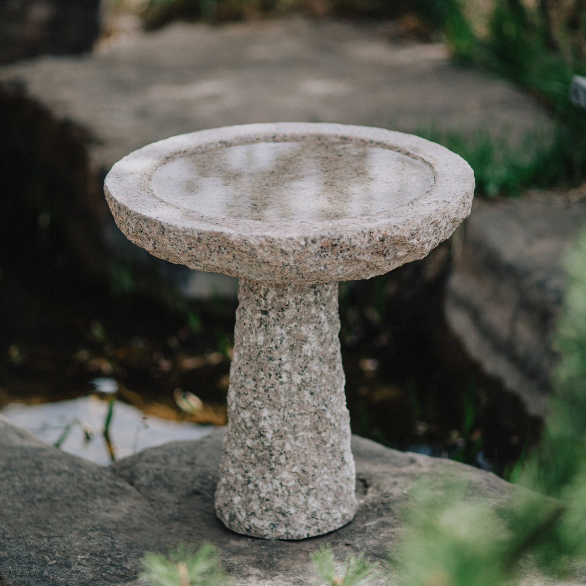 birdbath is hand-carved from Rose Granite with a rough chiseled finish image 2 of 4