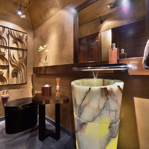 Stone Forest Veneto Pedestal Sink carved from a block of multi-onyx with a polished finish. image 7 of 7