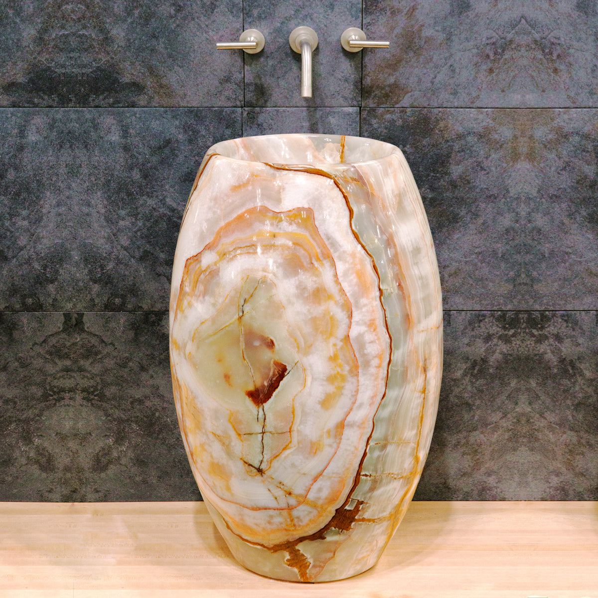 Stone Forest Barrel Pedestal Sink carved from a single block of multi-color onyx image 3 of 3