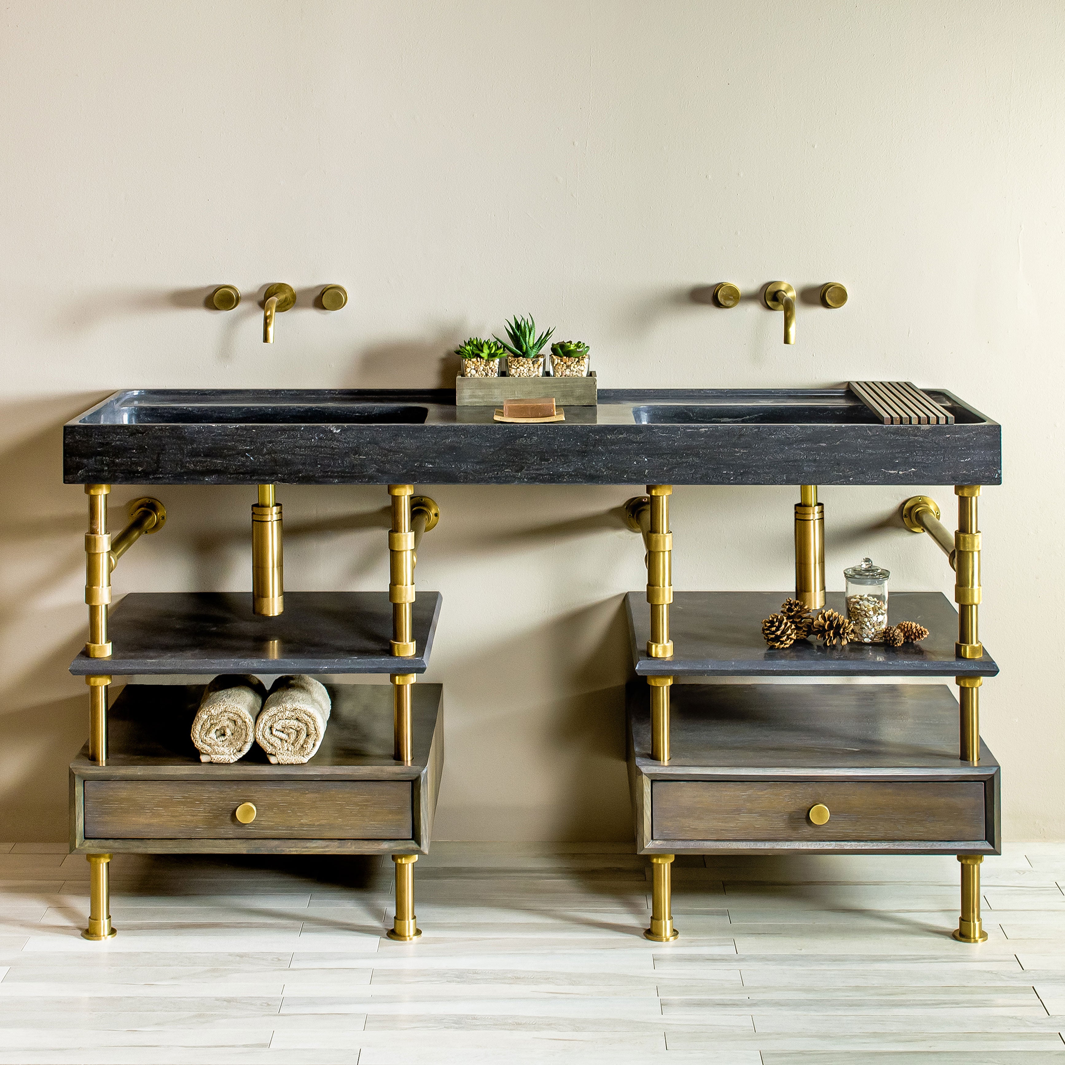 Custom Double Basin Ventus with Faucet Deck in antique gray limestone paired with Elemental Classic Console Vanity in aged brass