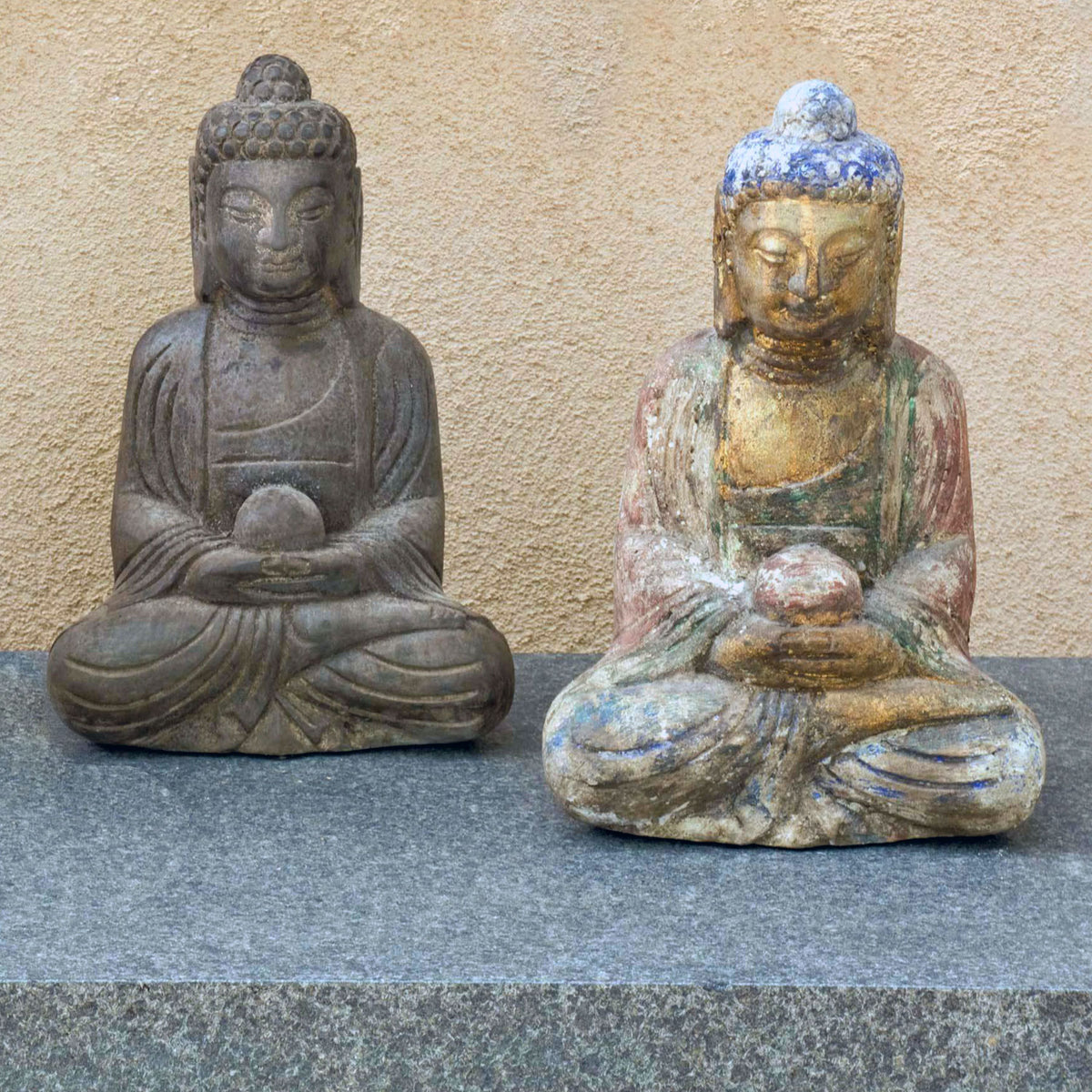 Two hand-carved one in dark limestone Buddha statues. One with with a painted finish. Both seated image 5 of 5