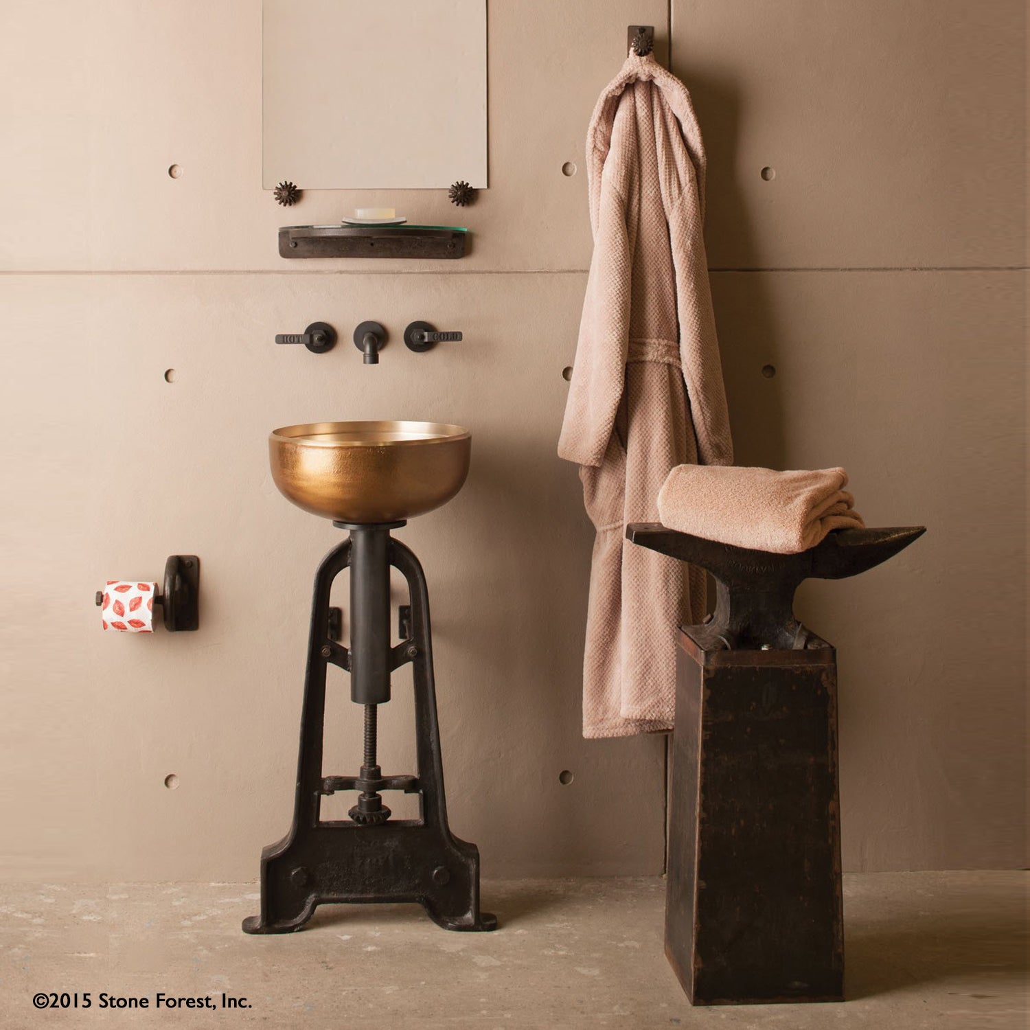 The Stone Forest golden bronze Ore Vessel Sink has a raw texture on the exterior created from the sand casting method, the inside has a smooth finish