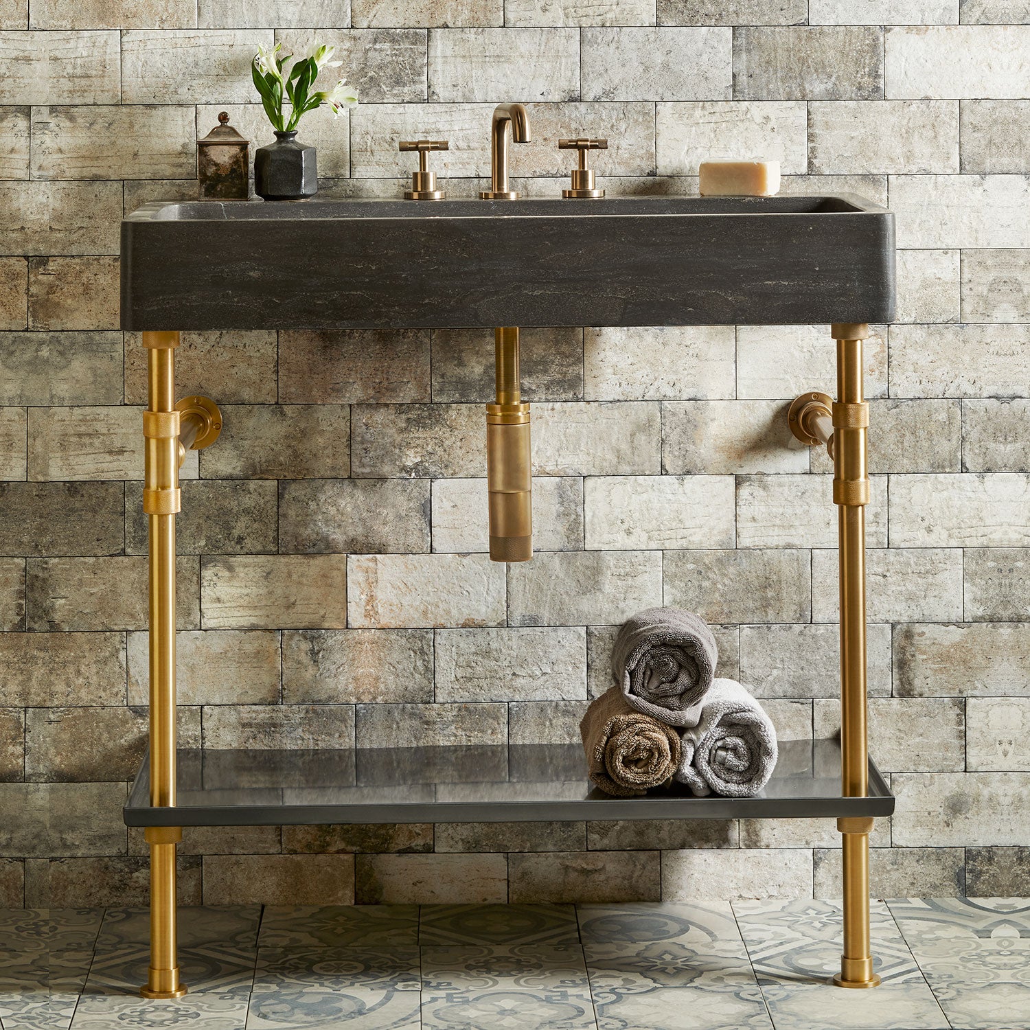 Antique gray limestone Trough console sink with a aged brass classid legs with metal tray underneath.