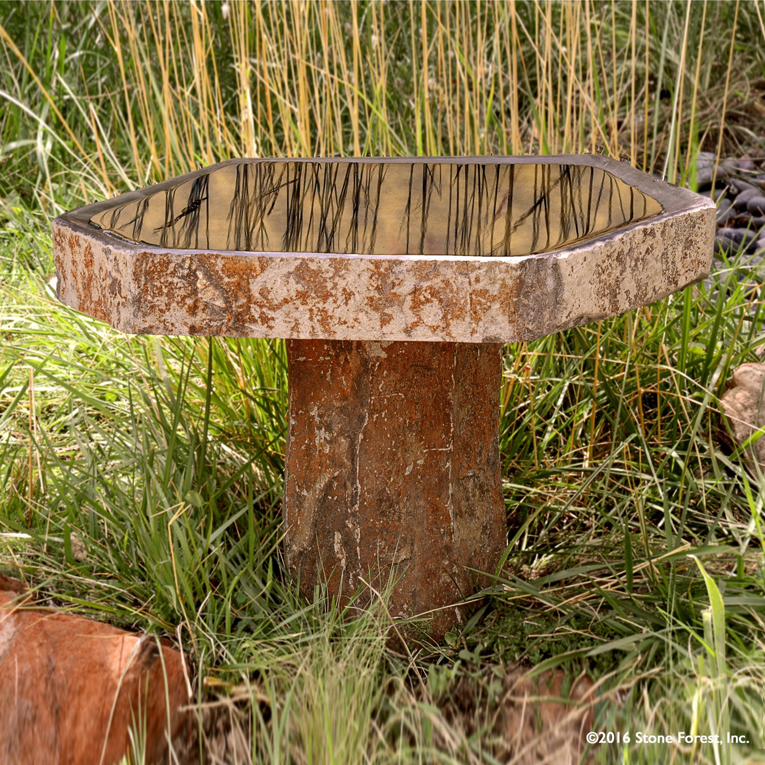 Stone Forest Basalt Birdbath, hand-carved from naturally occurring columns of basalt.
