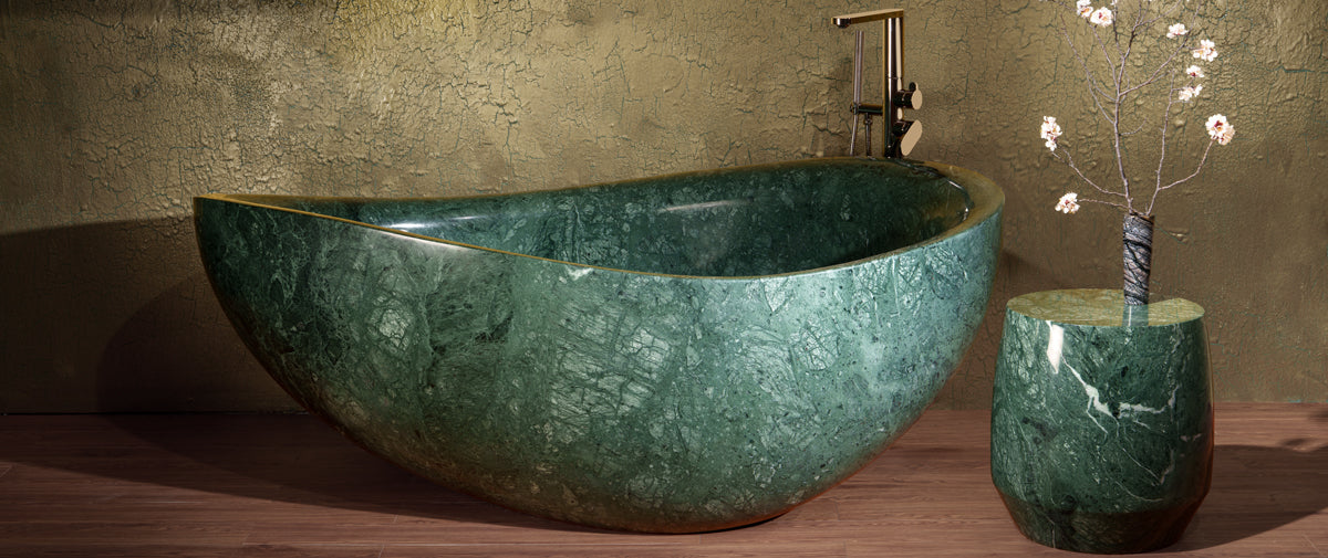  Papillon Tub is a solid stone carved of Indio Verde