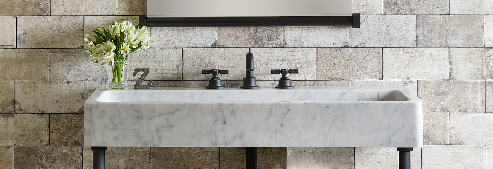 Trough Sink in Carrara Marble on matte black stand