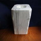 Pedestal sink in Carrara Marble with rough chiseled corners