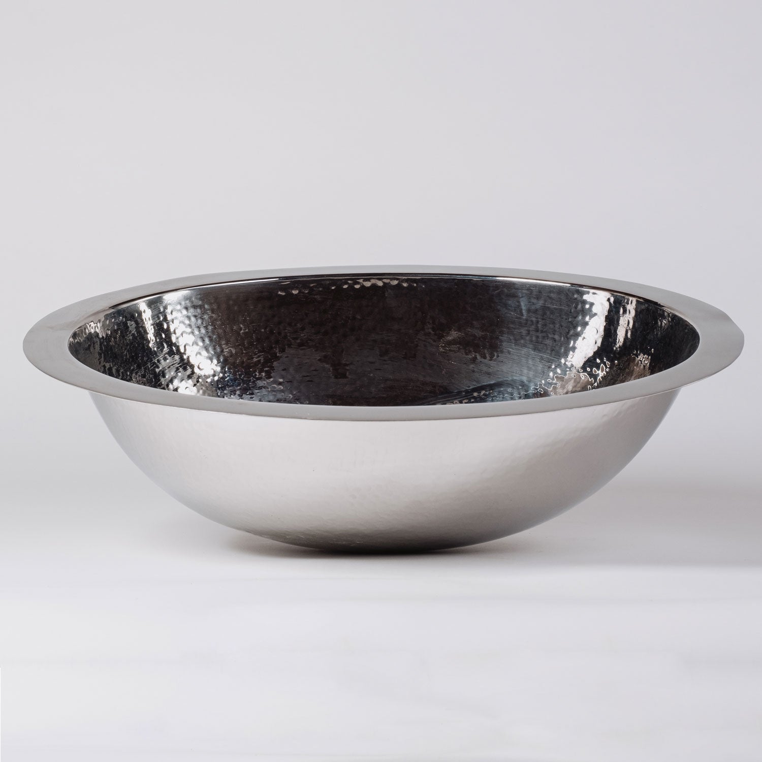 Stainless Steel Oval Bath Sink is hammered and has a polished finish.