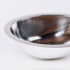 Stainless Steel Oval Bath Sink is hammered and has a polished finish.