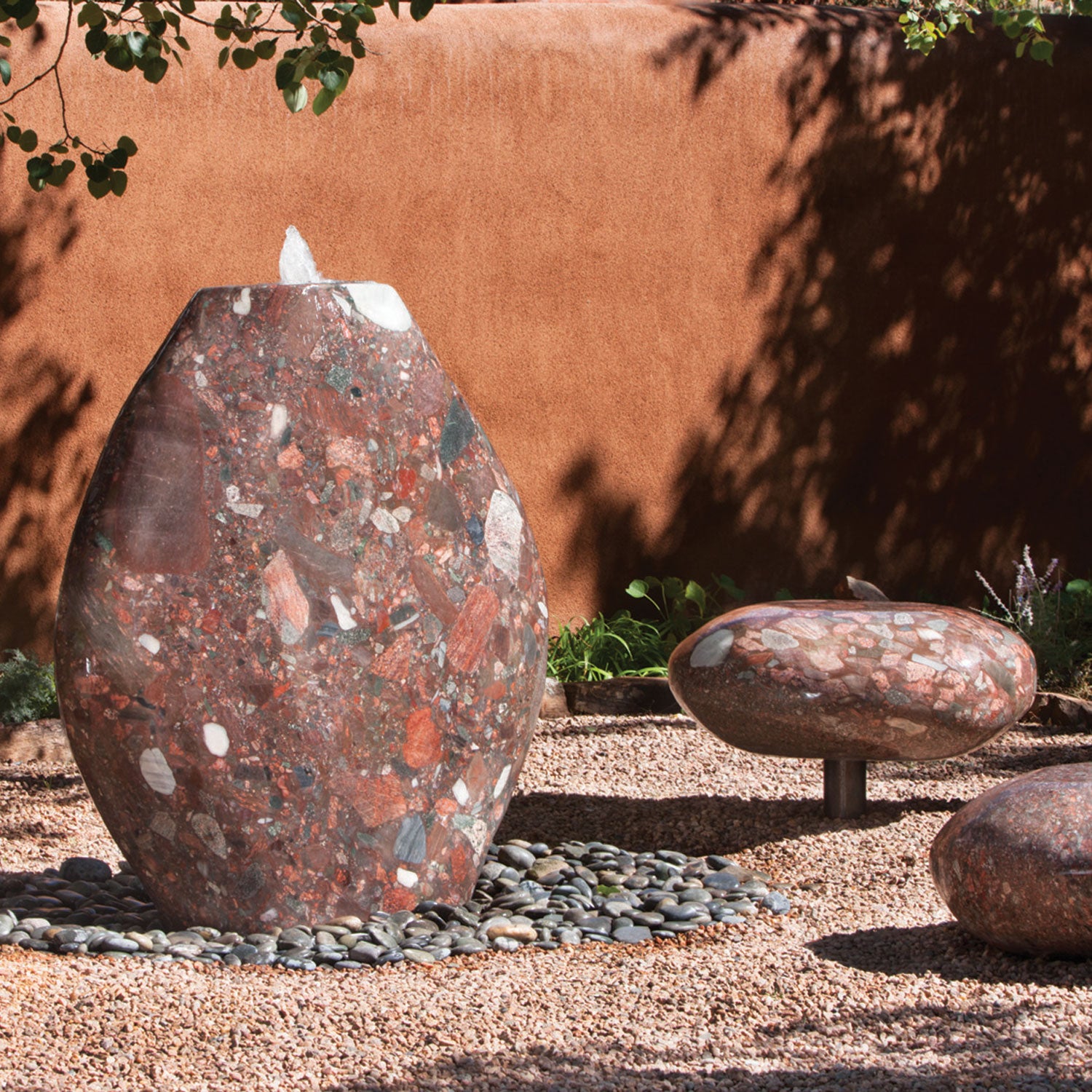 Pebble fountain and Pebble seats in Jurassic stone