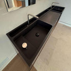 Three-piece custom bath sink in noce basalt
