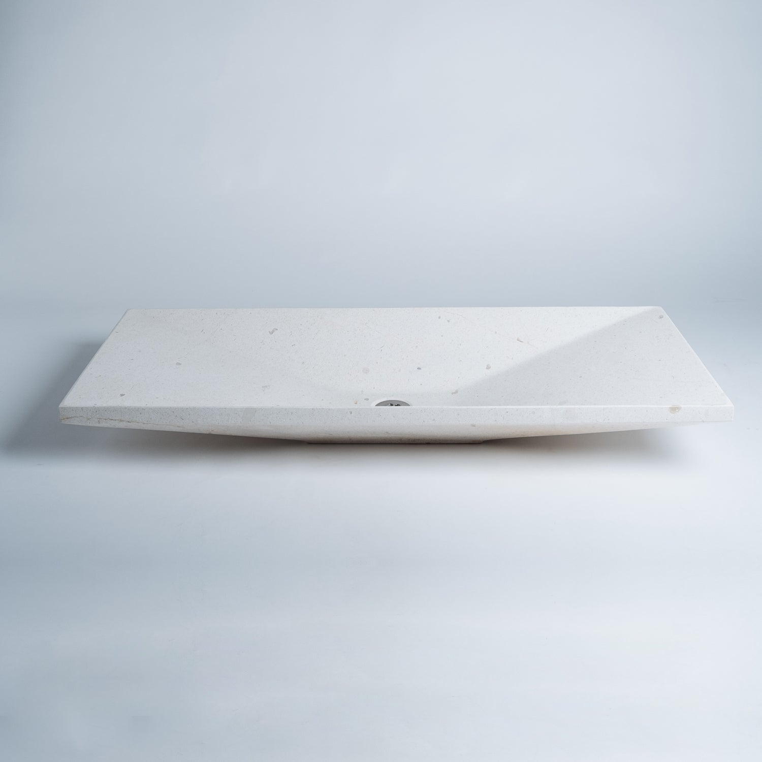 Verona Vessel sink crafted from a solid piece of Turkish limestone