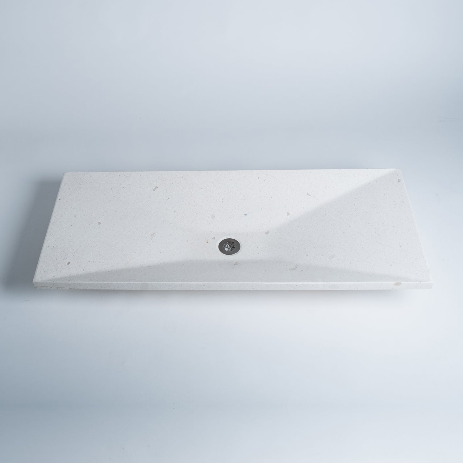 Verona Vessel sink crafted from a solid piece of Turkish limestone