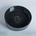  thin-walled vessel sink is carved from a solid block of black granite and finished to a high polish; Drain cover is included.