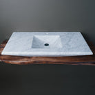 rectangular-shaped carrara marble vanity sink with a polished finish