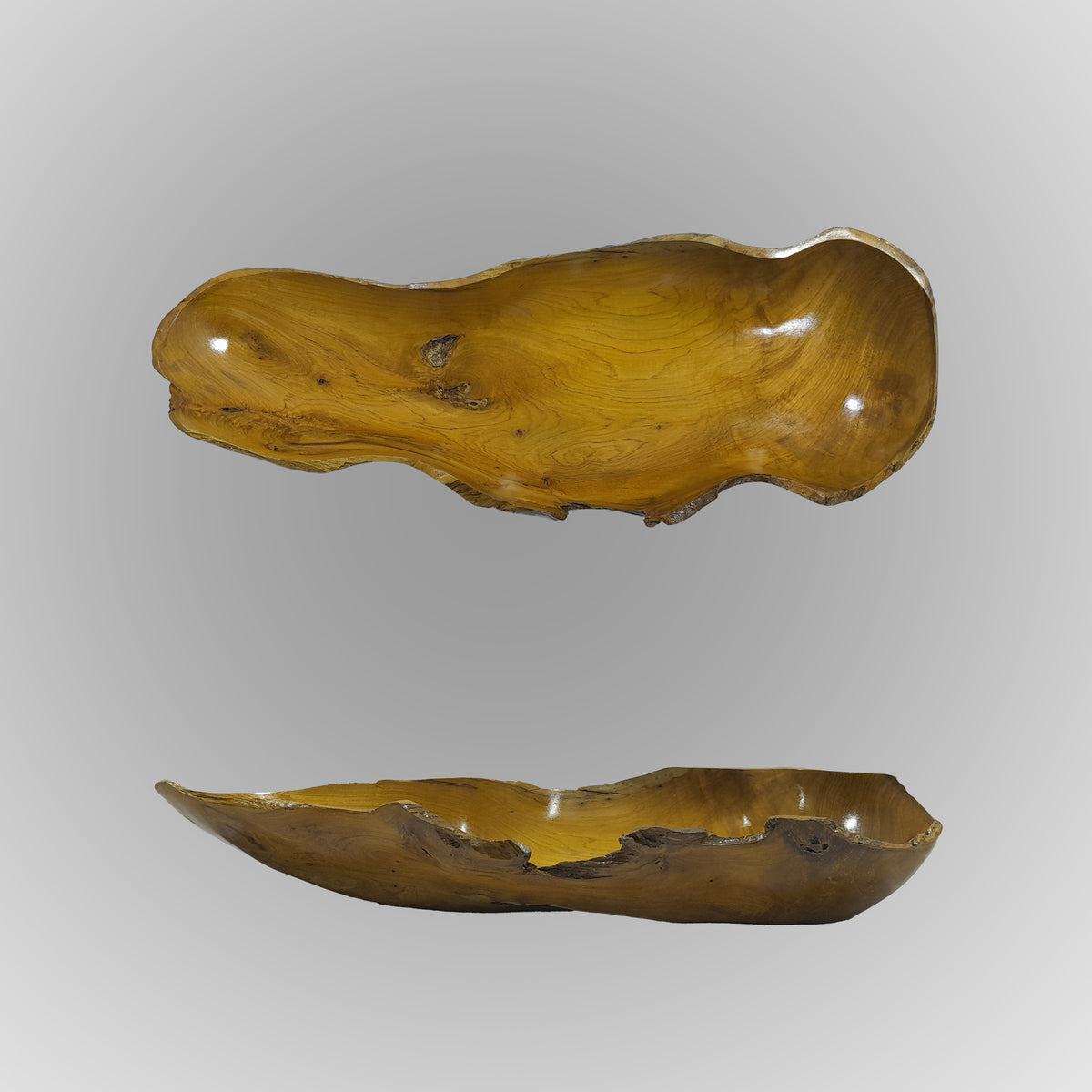 Two wooden bowls with natural grain patterns on a gray background image 8 of 10