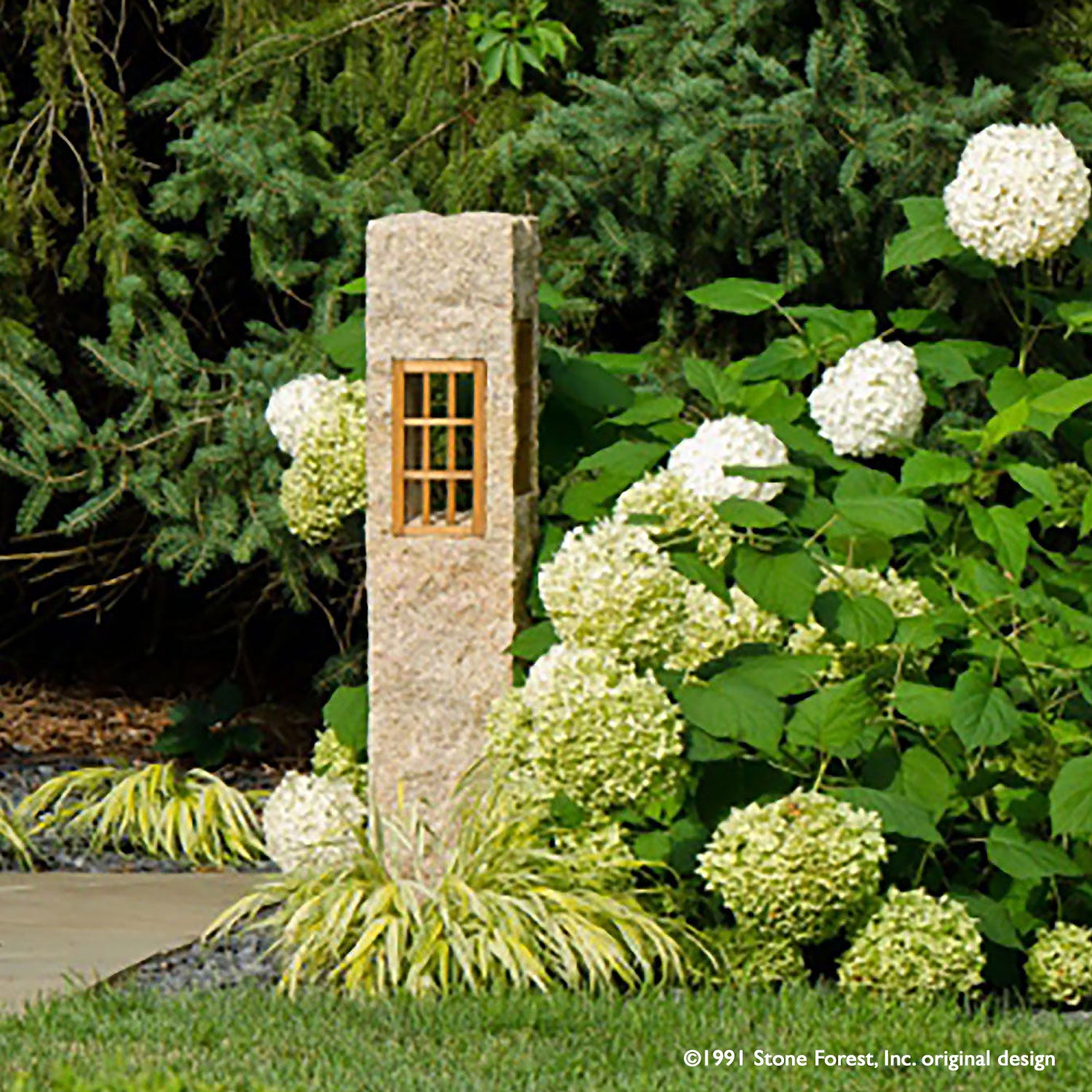 Our Rough Post Stone Lantern is hand-carved from beige granite and accented by wood windows. 