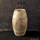 Barrel Pedestal Bath Sink carved from multi-color onyx
