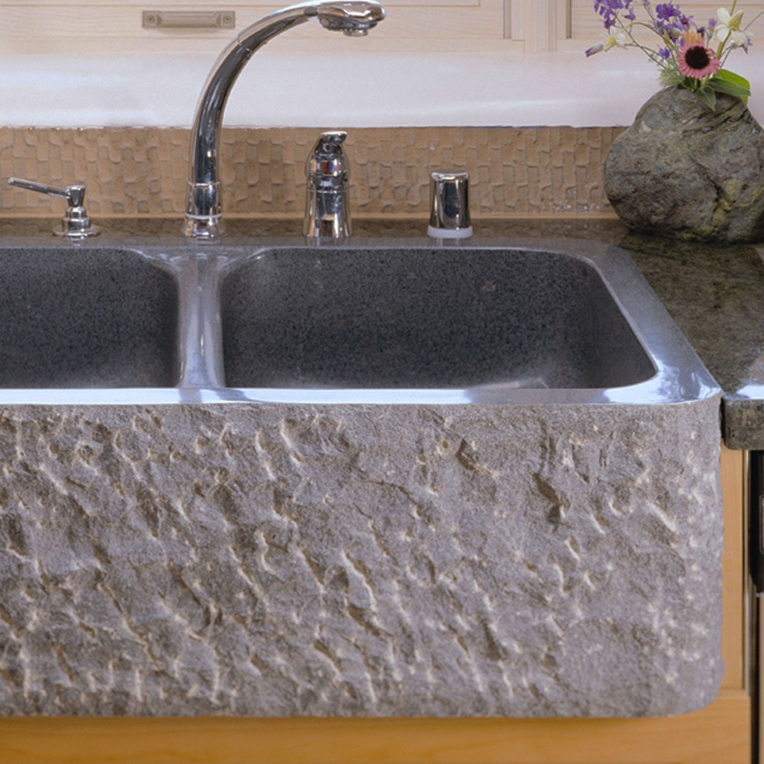 Custom rough front farmhouse sink in blue-gray granite