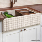 Workstation Farmhouse Kitchen Sinks with basketweave carving on the apron